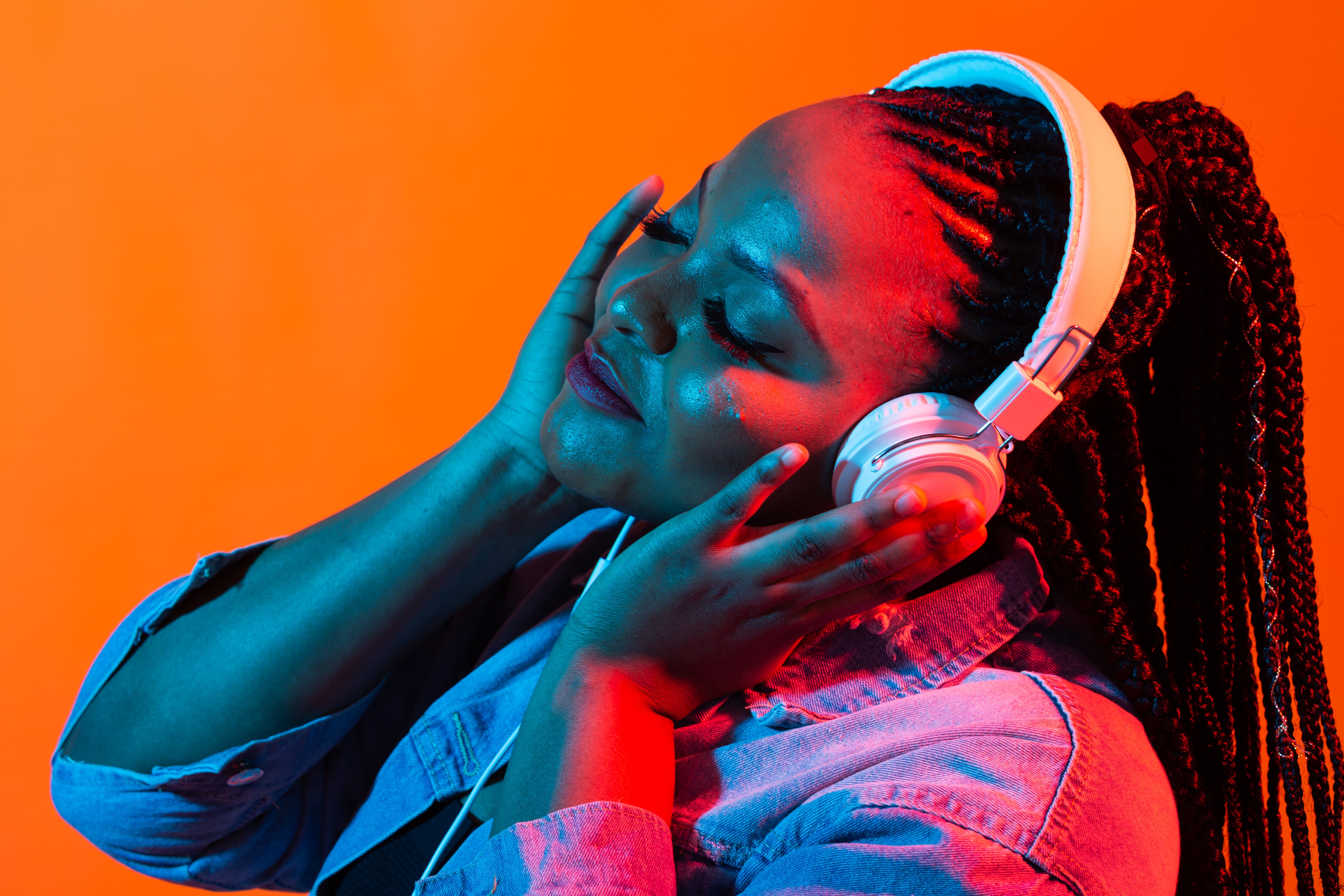 Young woman enjoying music with headphones